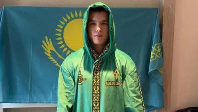 Санжар Адилов